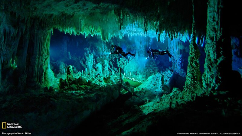 Scuba Divers in Cave — Green, Dramatic