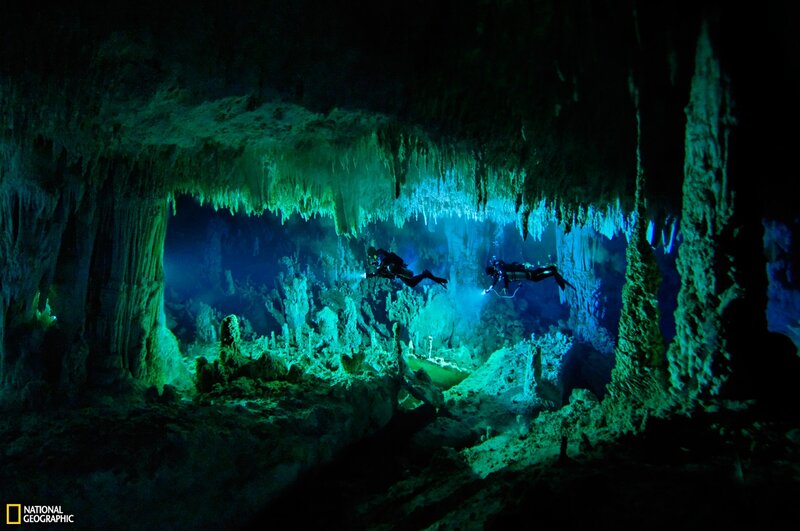 Scuba Divers in Cave