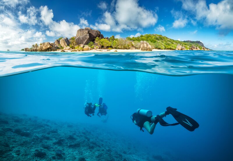 Scuba Divers Underwater — Blue, Serene, Afternoon