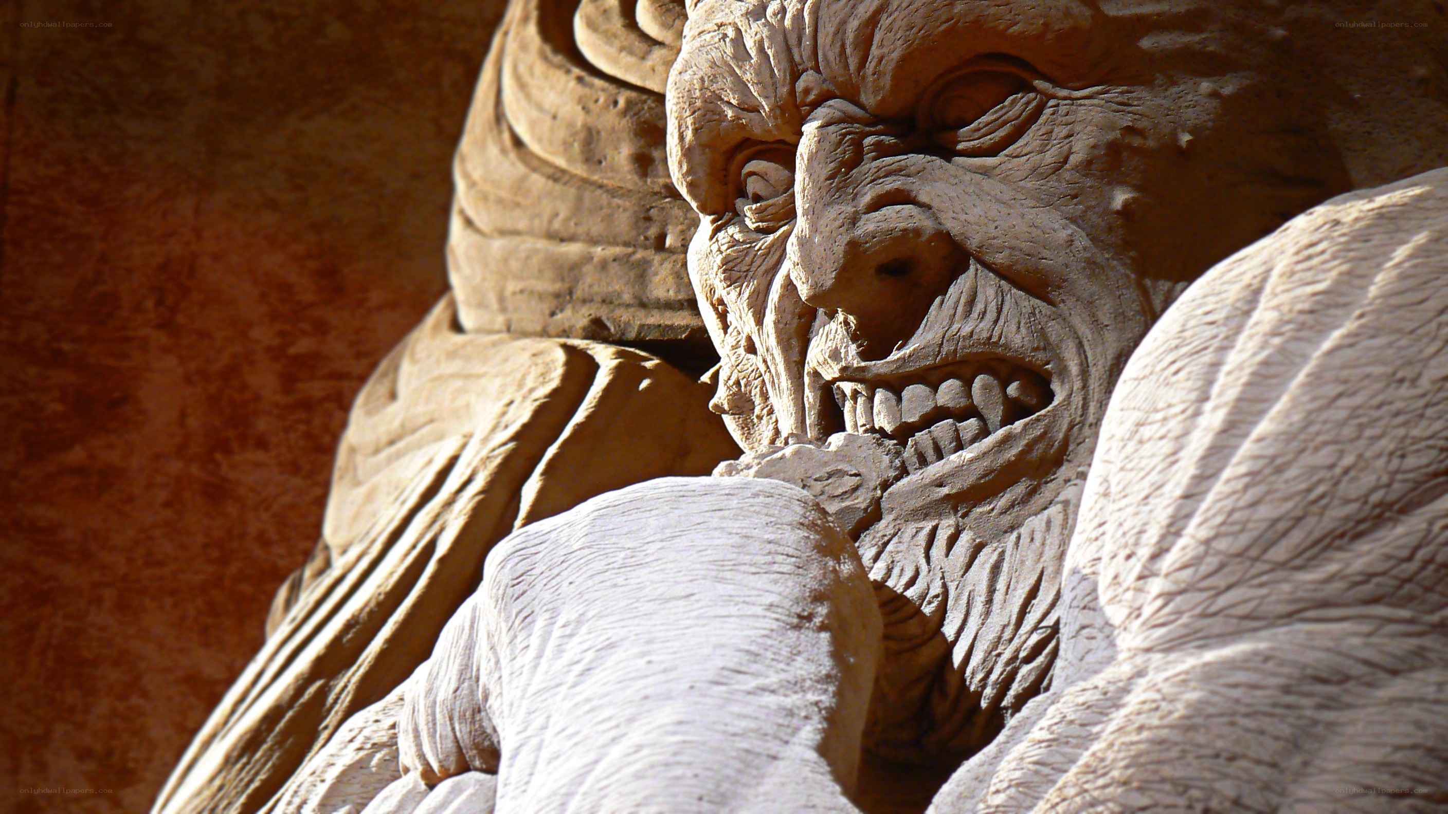 sculpted demon face
