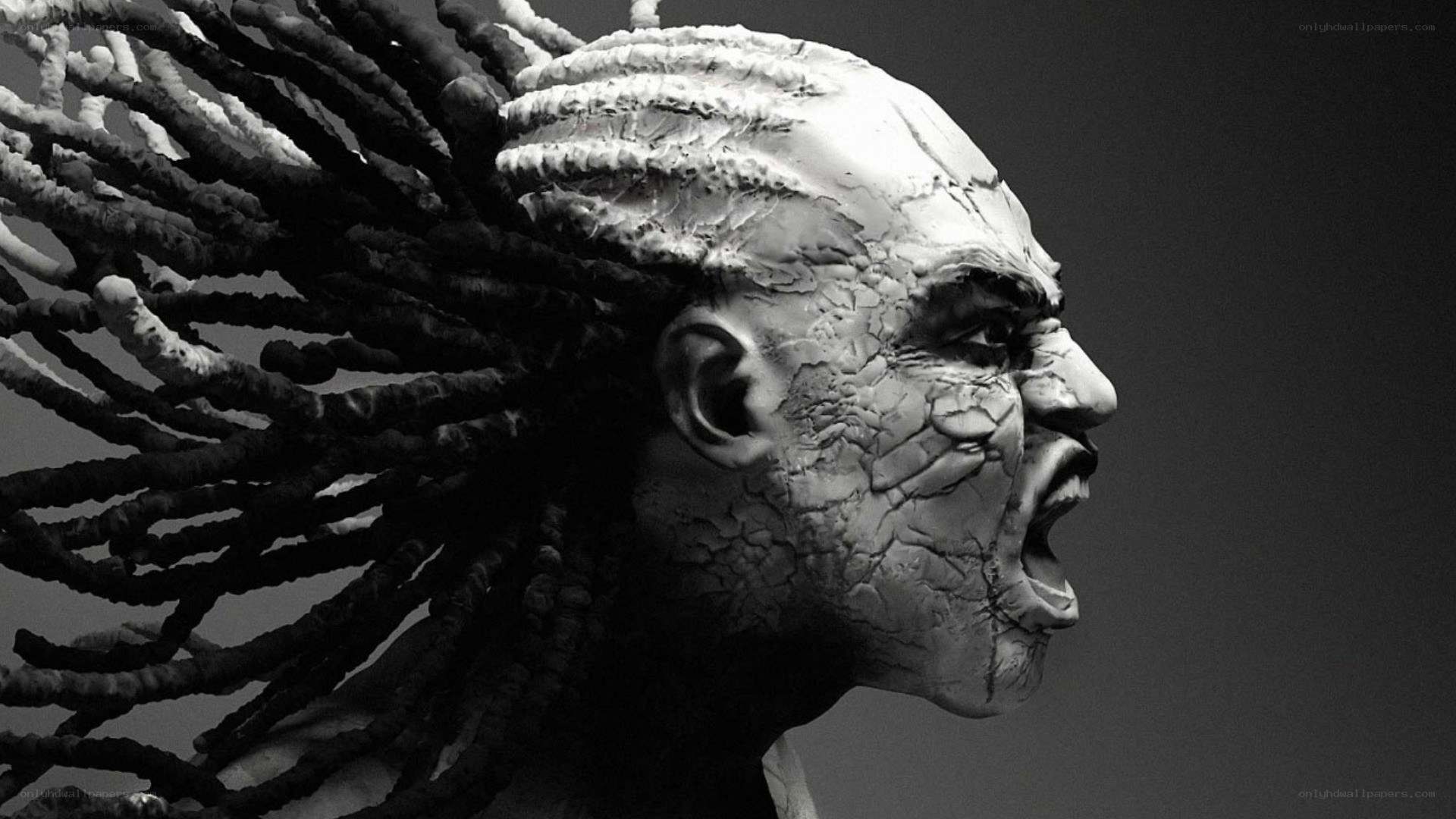 sculpted head with dreadlocks