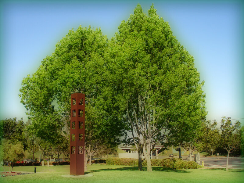 Sculpture in a park with trees