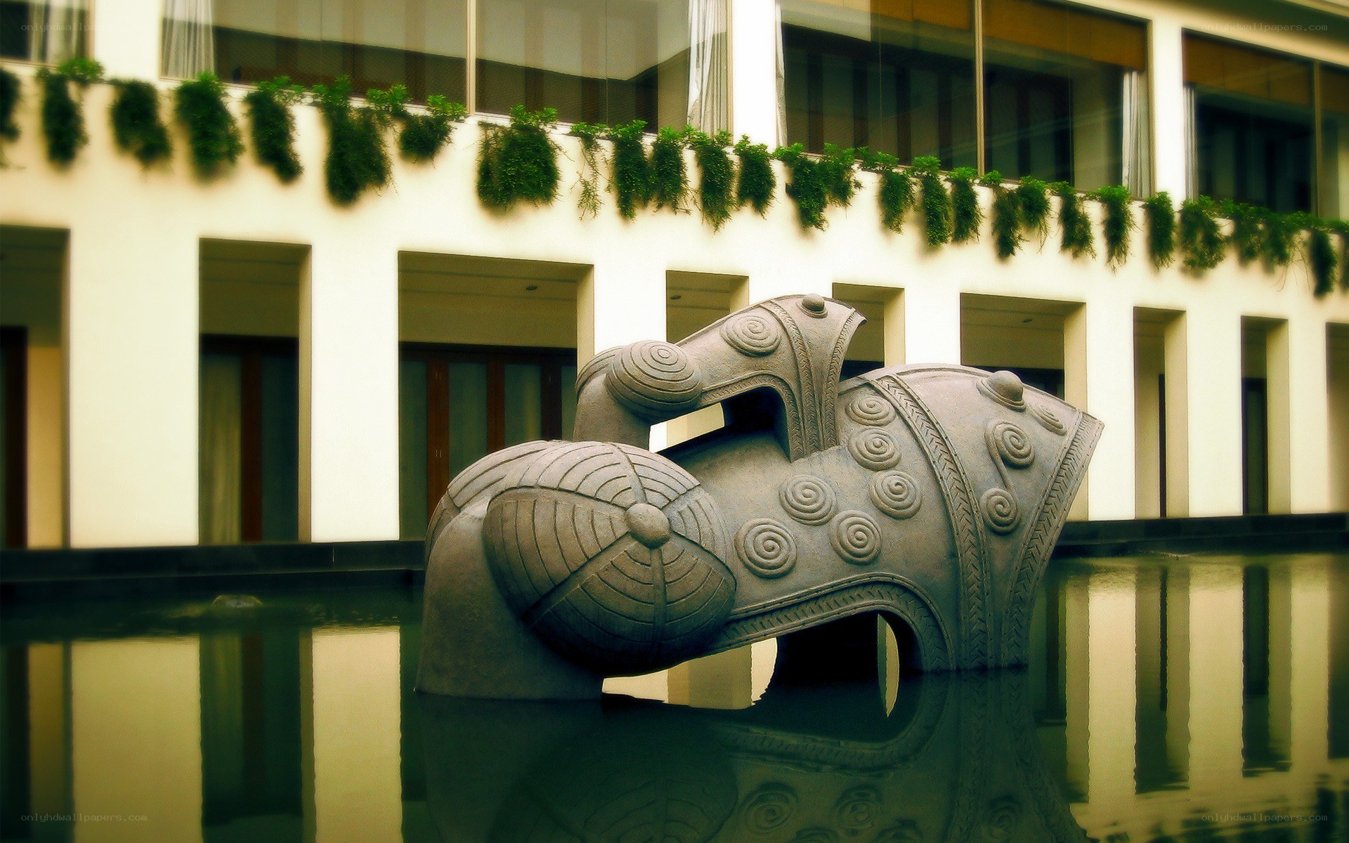 sculpture in water courtyard