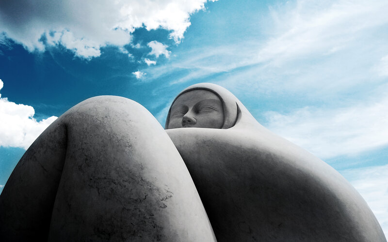 Sculpture of a resting figure