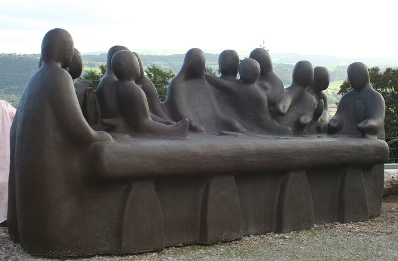 Sculpture of figures at a table