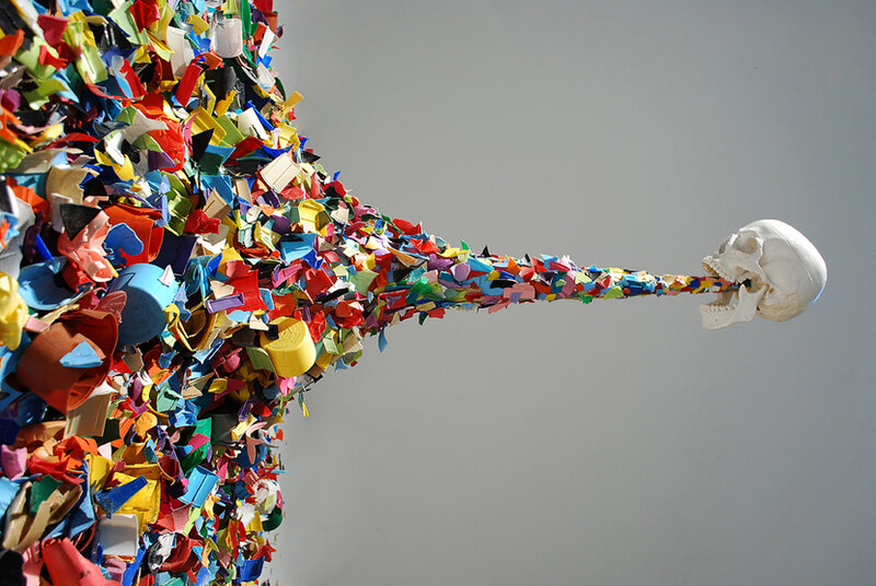 Sculpture of skull with plastic waste