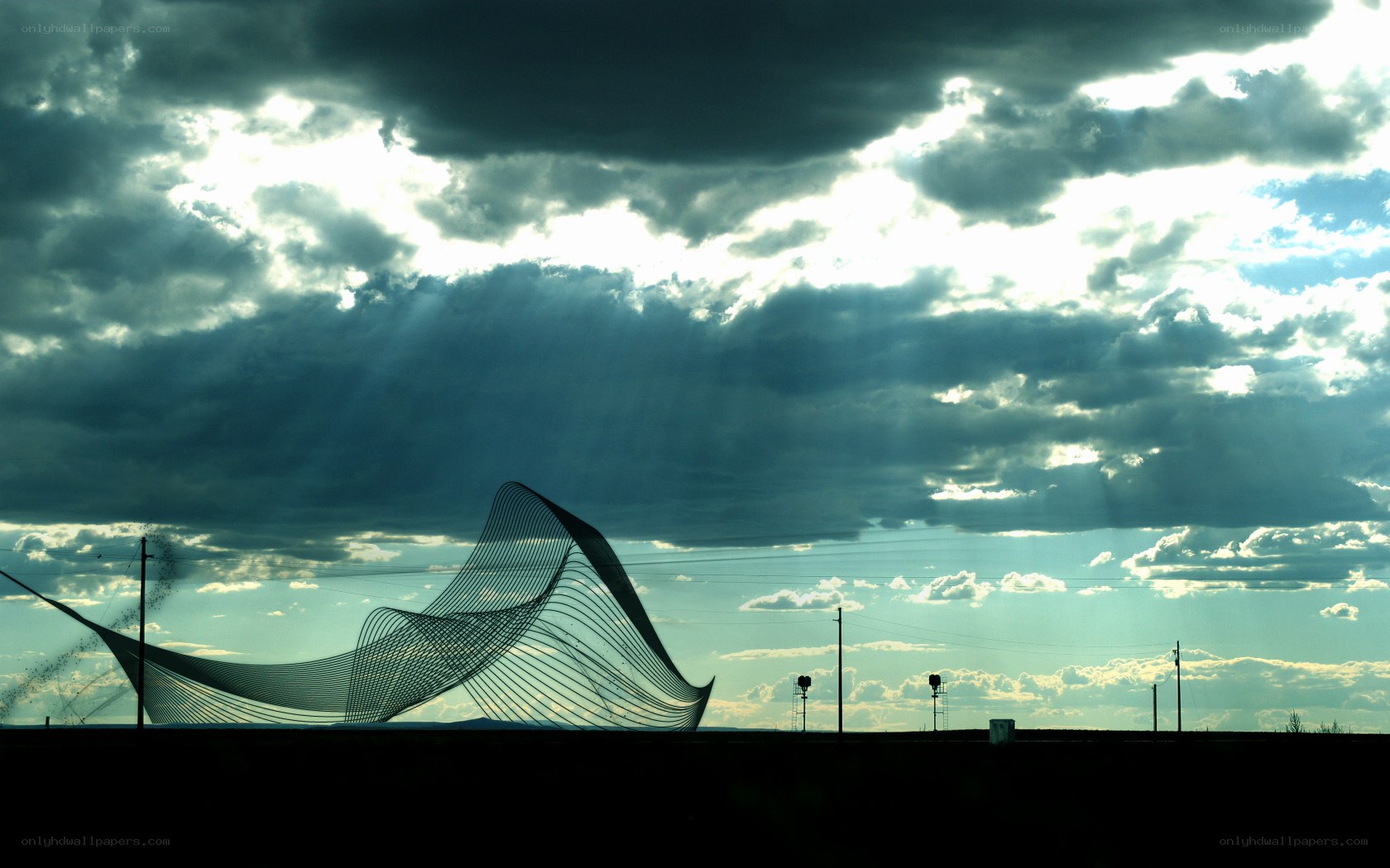 Sculpture under stormy sky