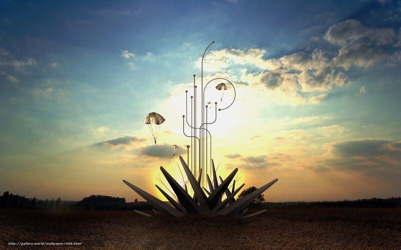 Sculpture with parachutes at sunset