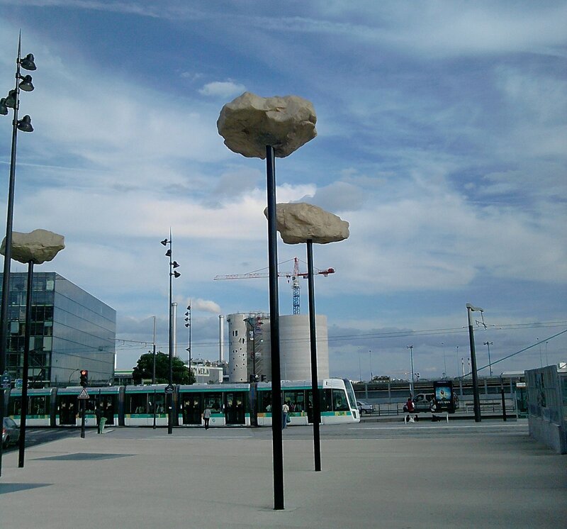 Sculpture with Rocks on Poles