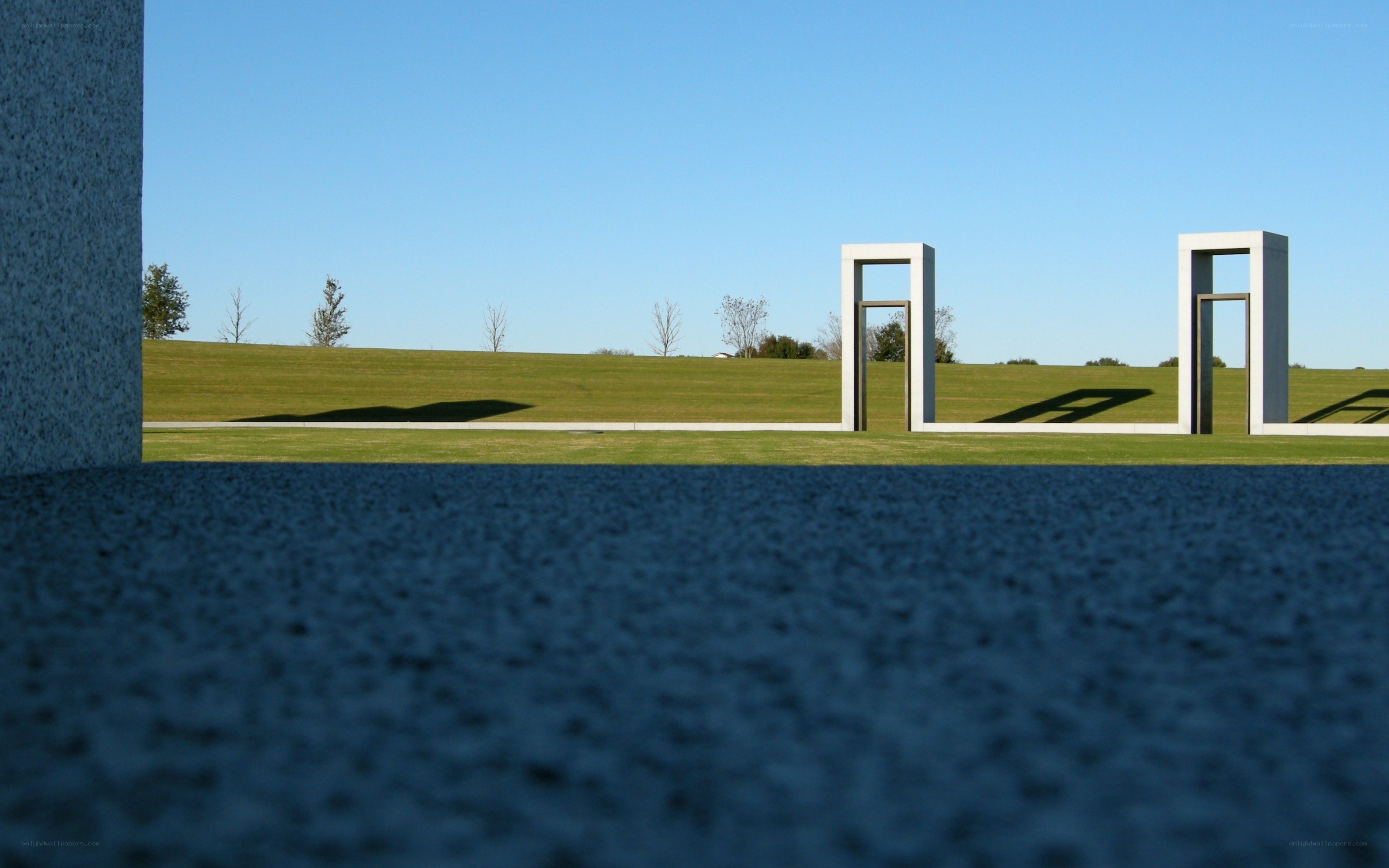 Sculptures on a grassy hill