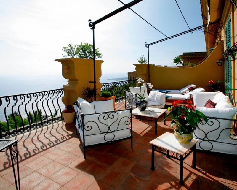 Sea-view terrace with outdoor furniture