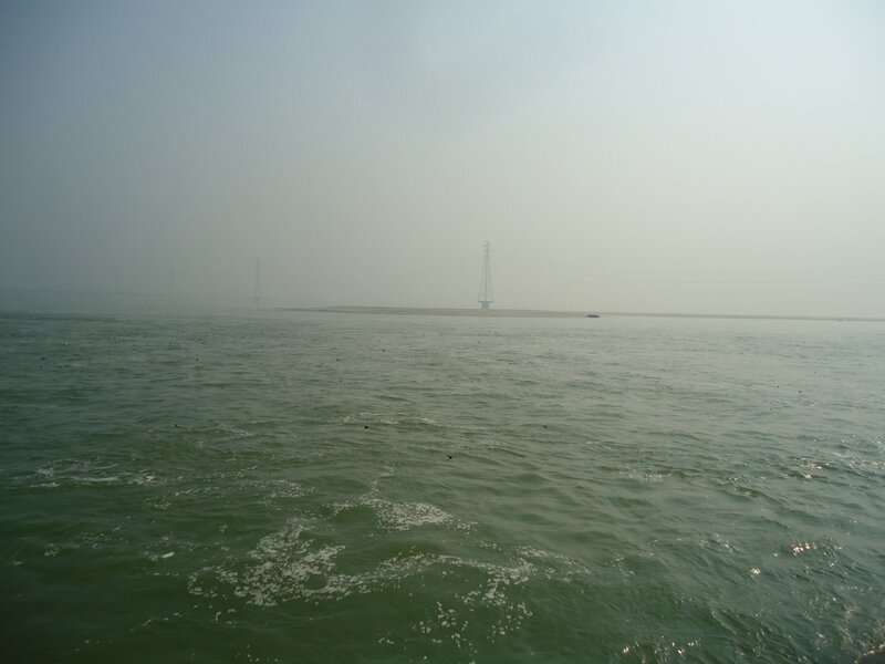 Sea with Distant Towers