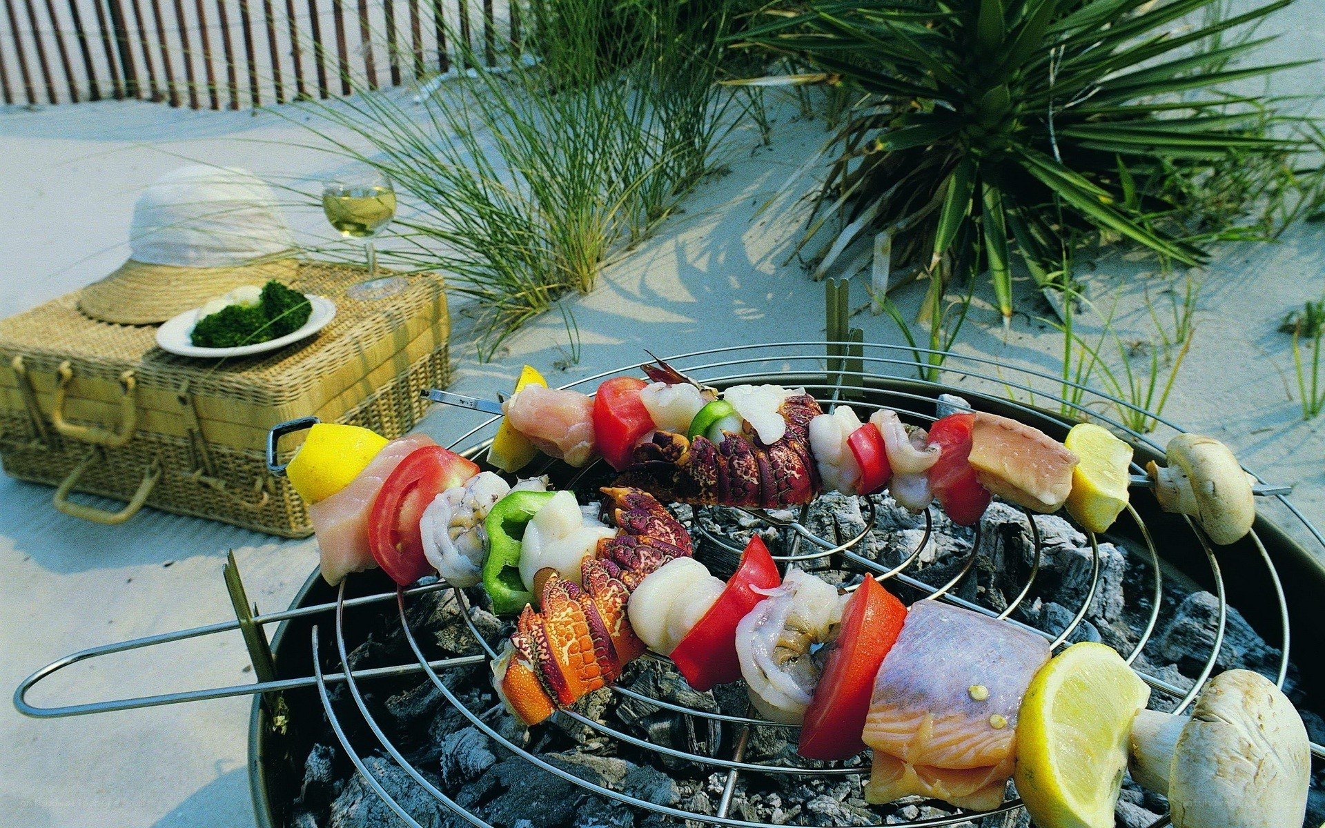Seafood skewers on beach grill
