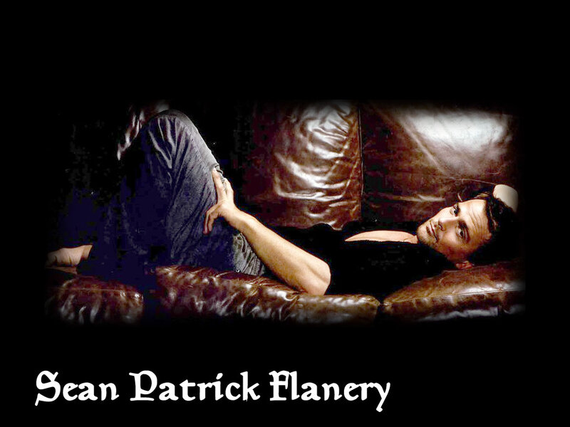 Sean Patrick Flanery on a couch