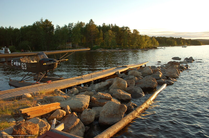 Seaplane at a lakeside dock