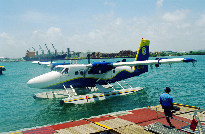 Seaplane at dock in harbor