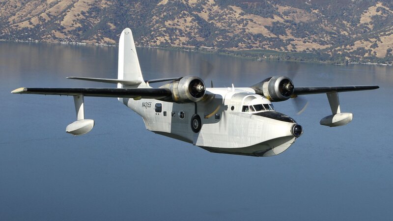 Seaplane Flying over Lake — Blue, Serene
