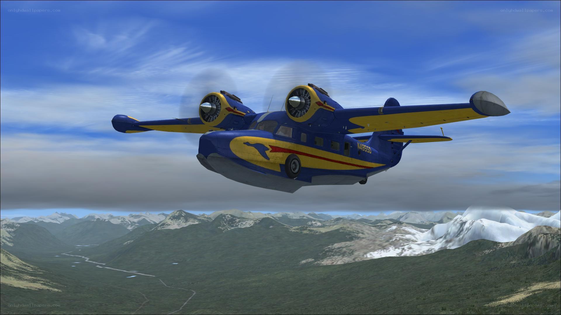seaplane flying over mountains
