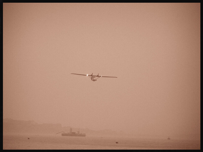 seaplane flying over water