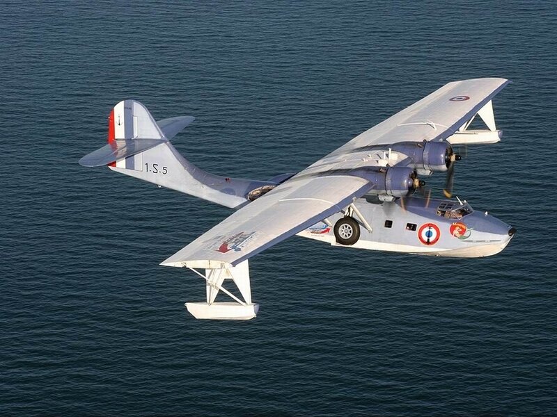 Seaplane Flying over Water — Blue