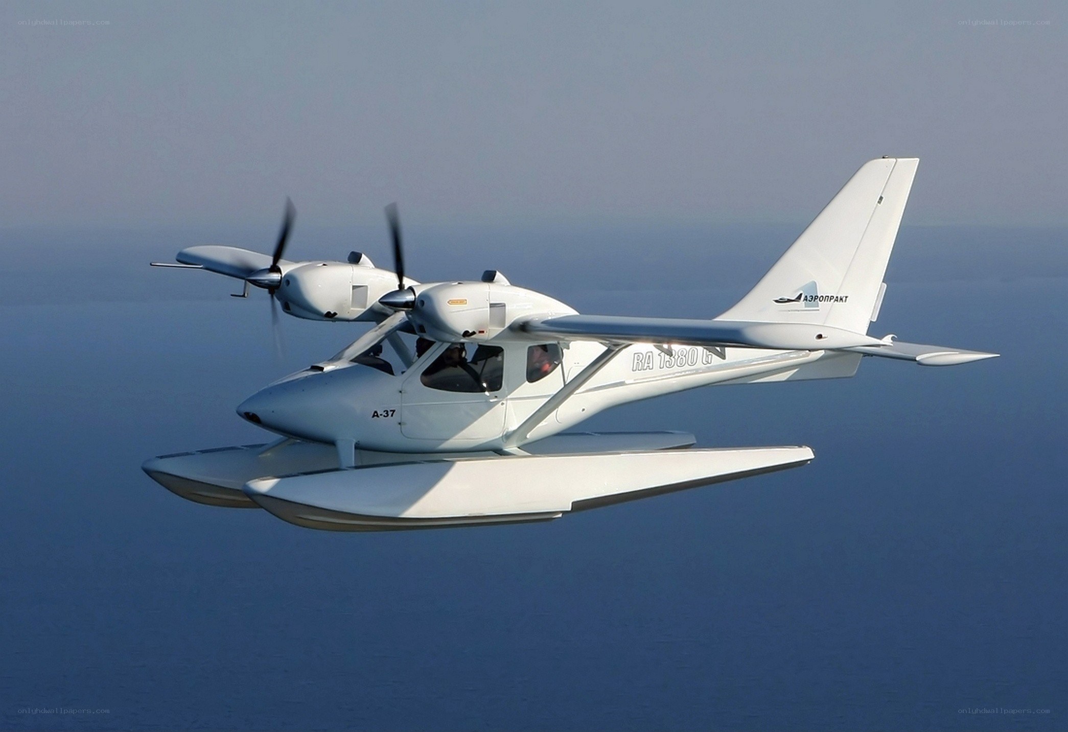 Seaplane flying over water