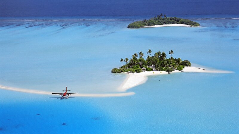 Seaplane Near Tropical Island — Blue, Serene, Afternoon