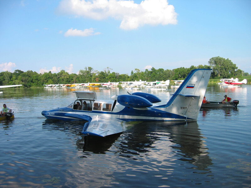 Seaplane on a lake with other aircraft