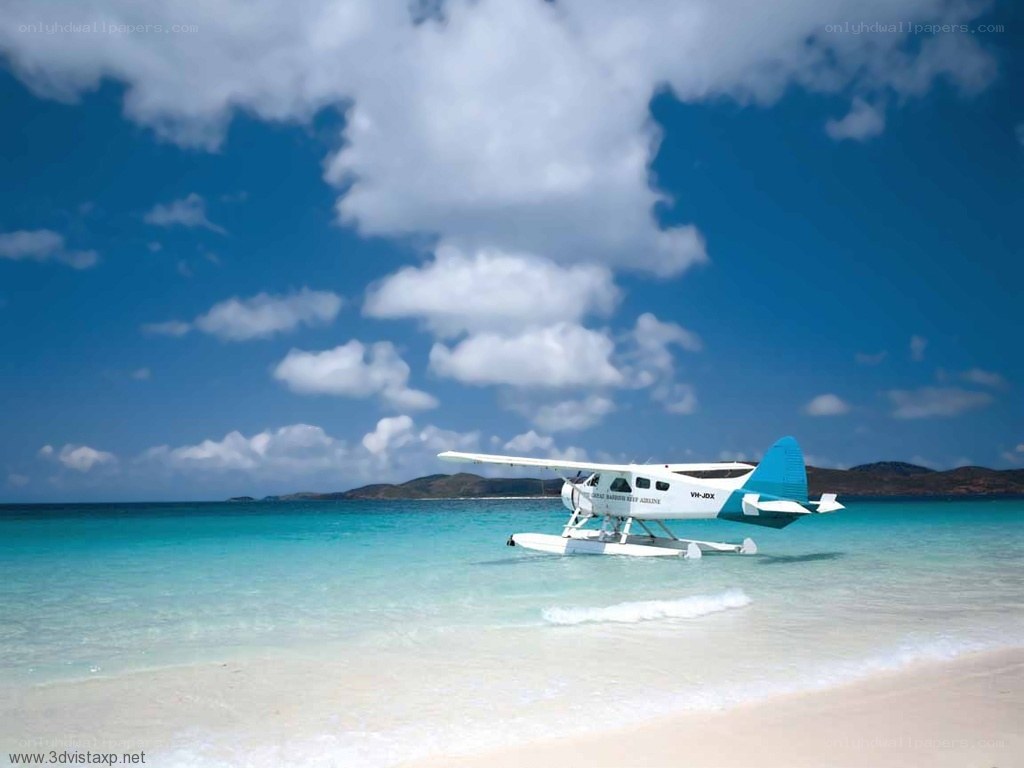 Seaplane on tropical beach