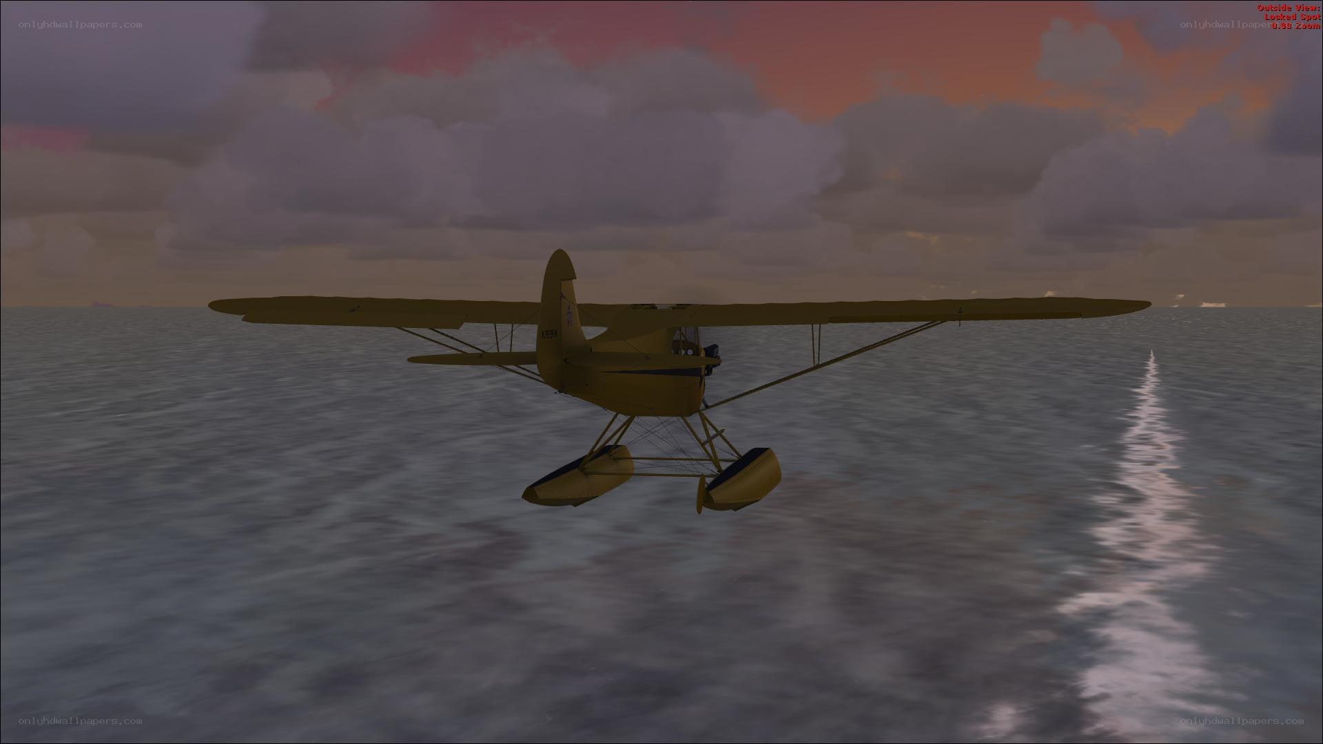 seaplane over ocean at dusk
