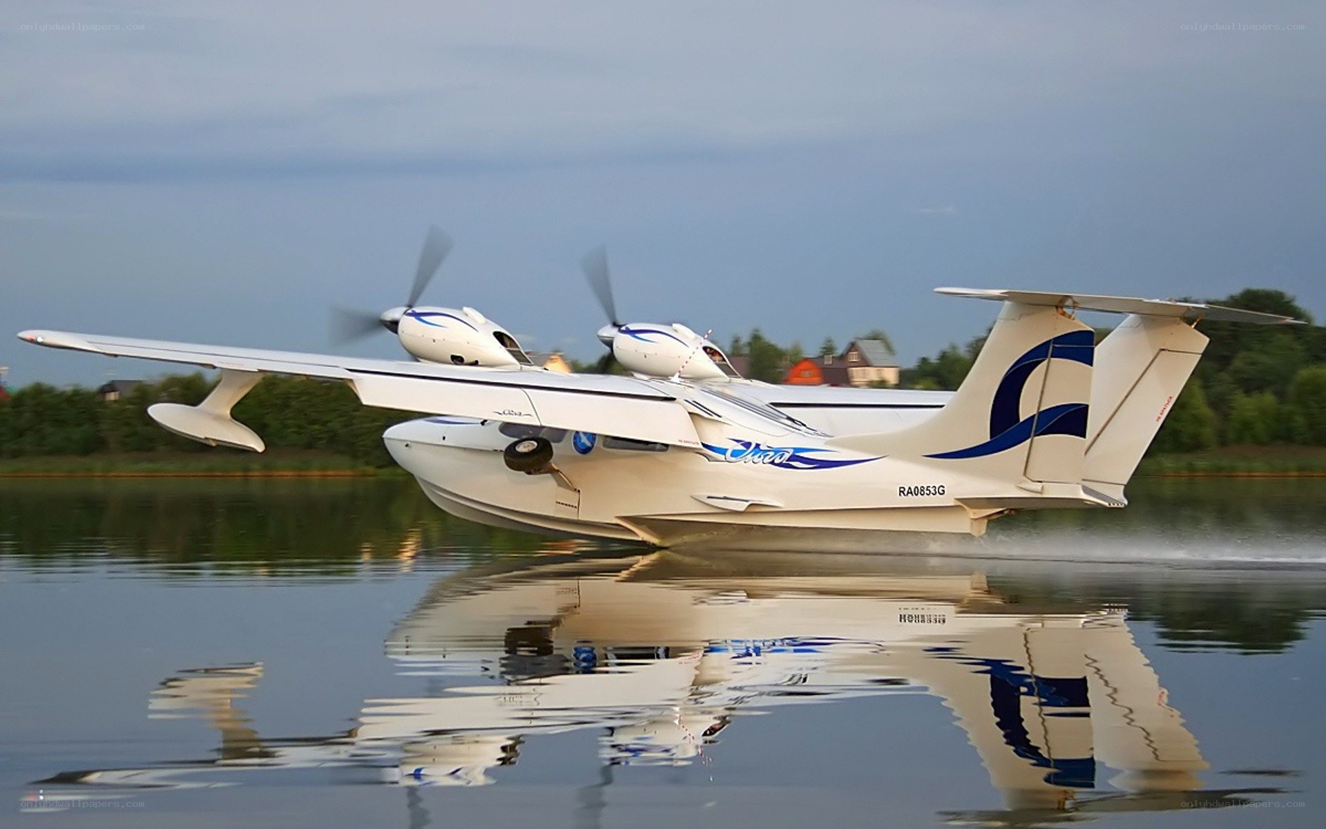 Seaplane taking off from water