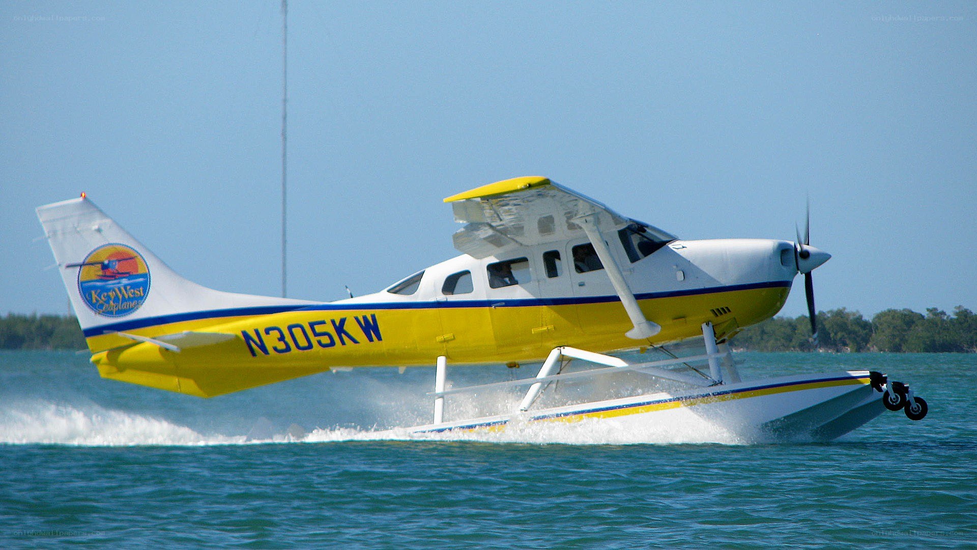 seaplane taking off from water