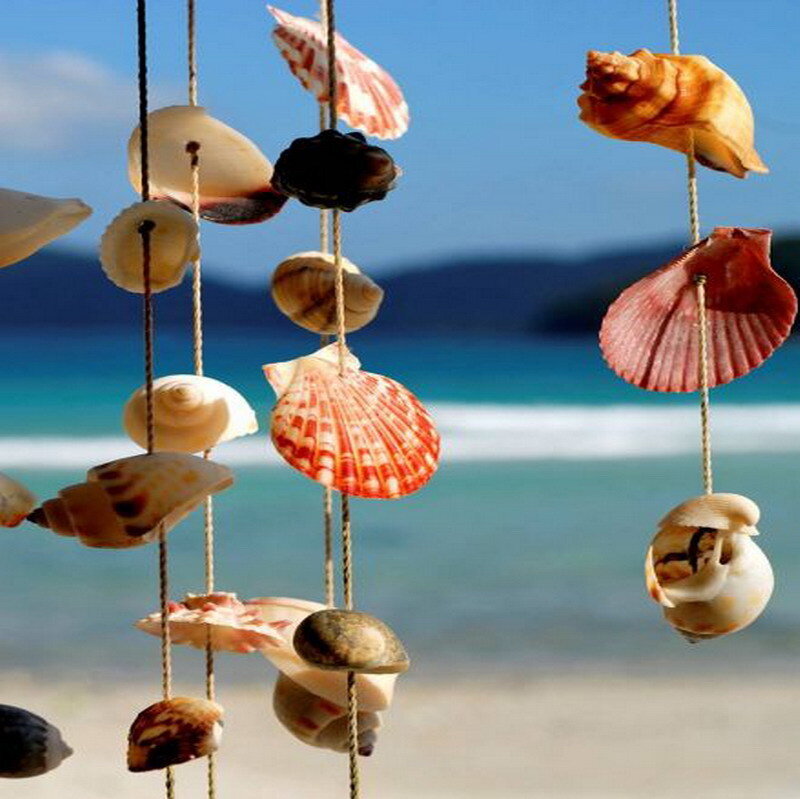 Seashell wind chimes on beach