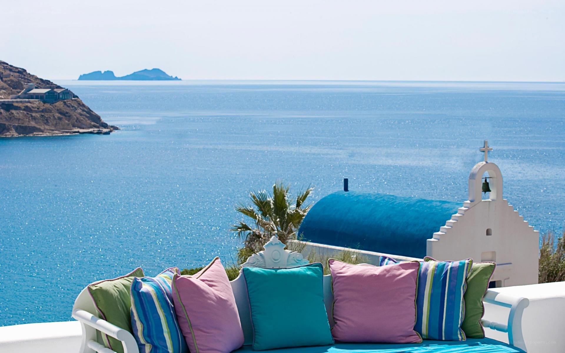 Seaside view with colorful pillows
