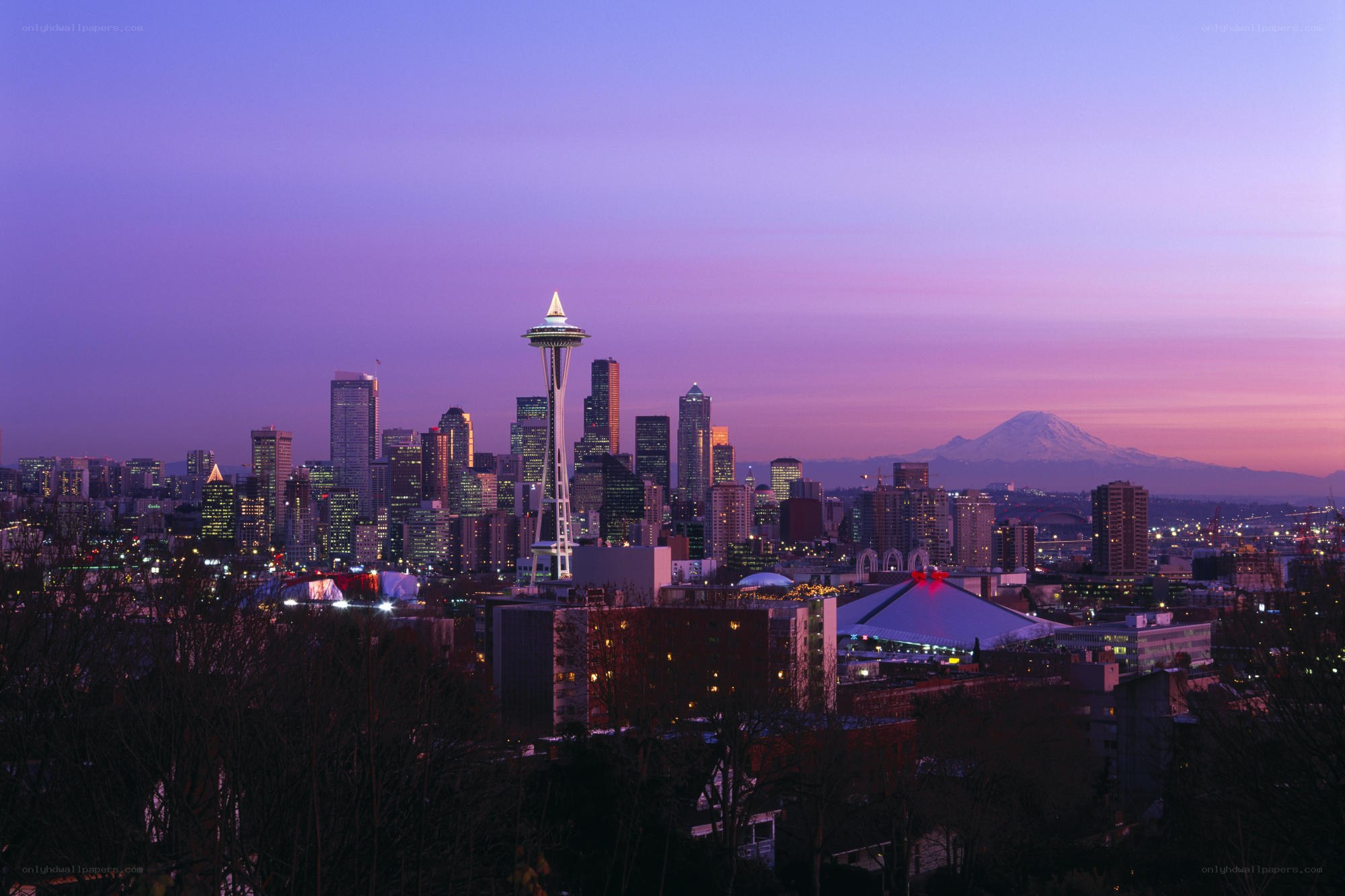 Seattle skyline at dusk with Mount Rainier