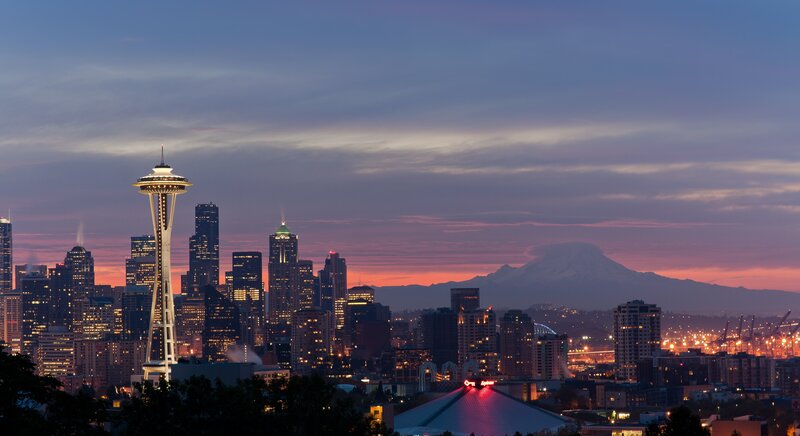 Seattle skyline at dusk with Mount Rainier