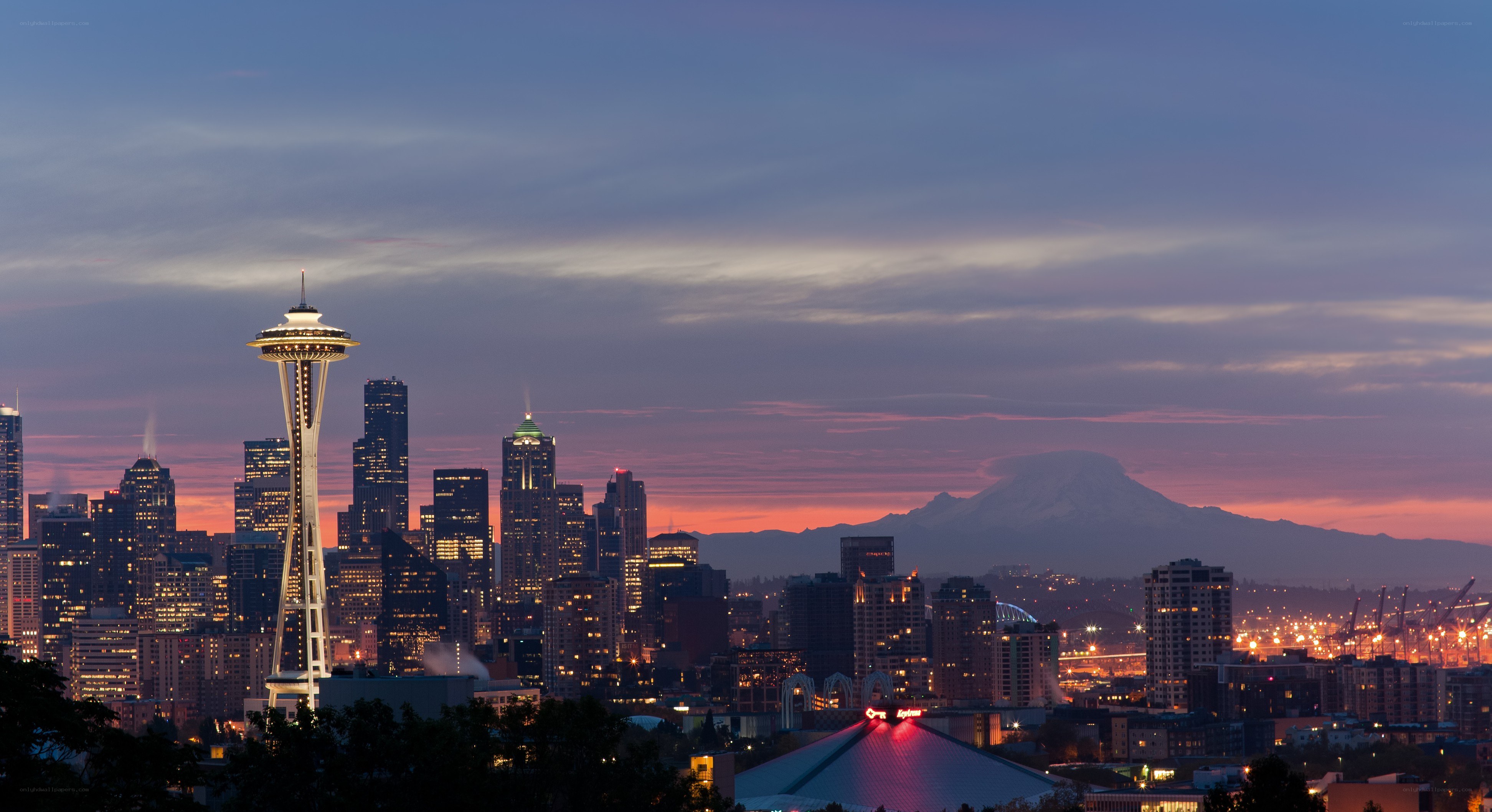 Seattle skyline at dusk with Mount Rainier