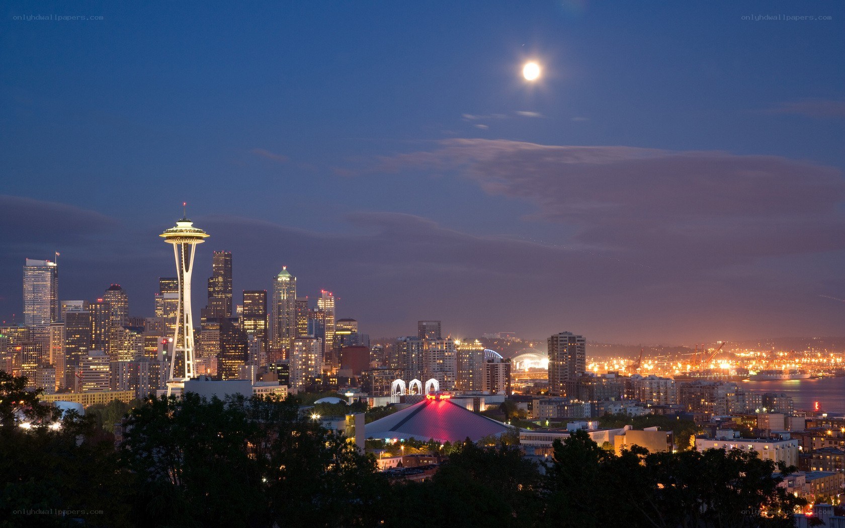 Seattle skyline at night with moon