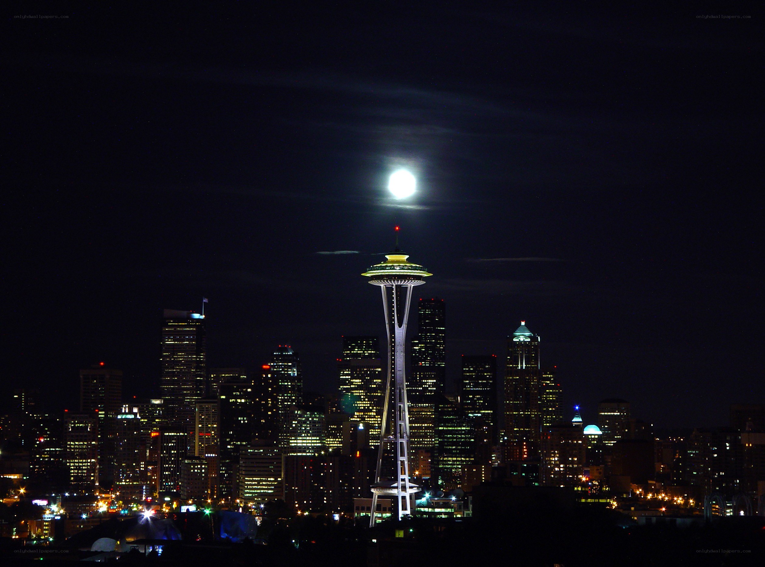 Seattle skyline at night with moon