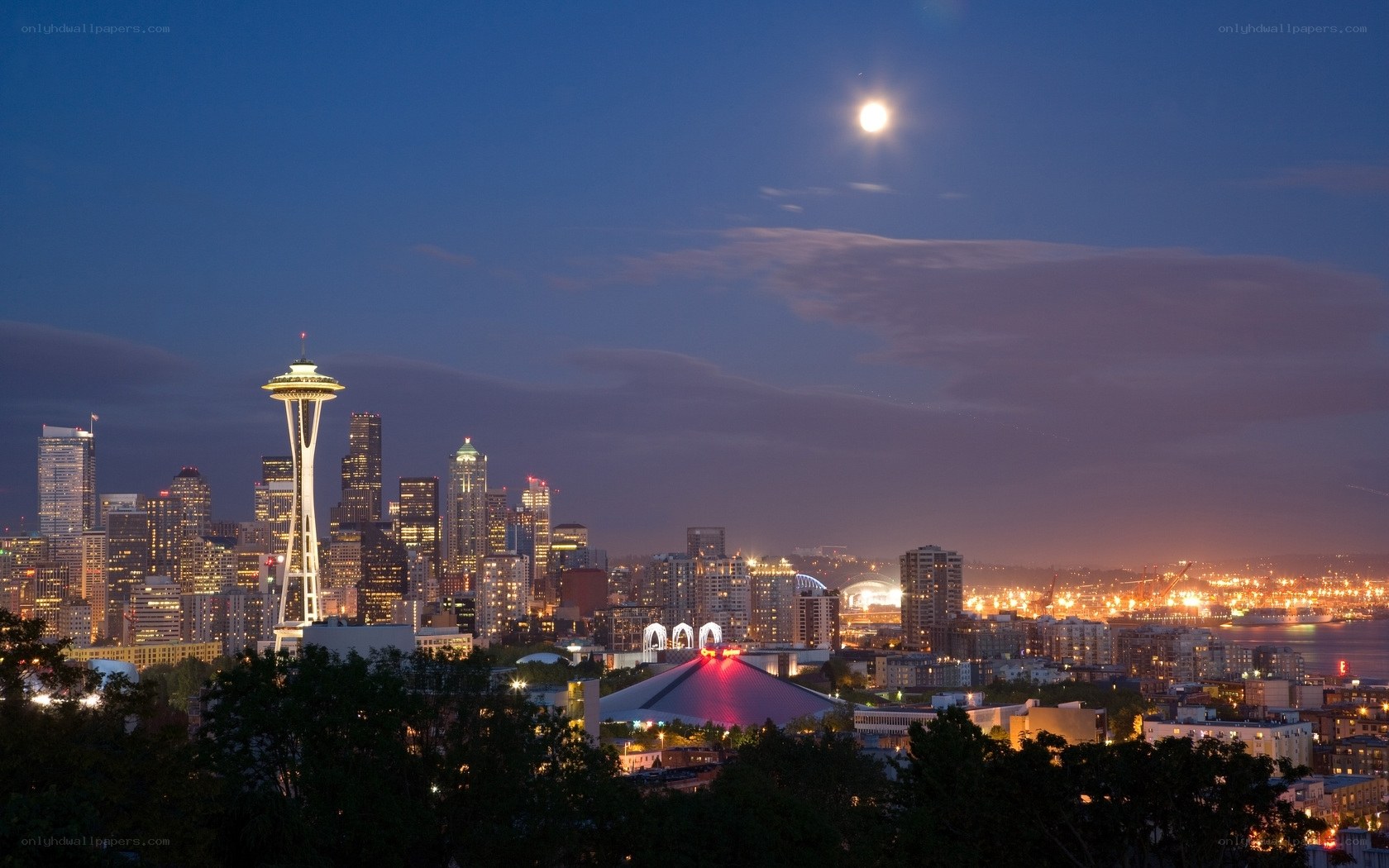 Seattle skyline at night with moon