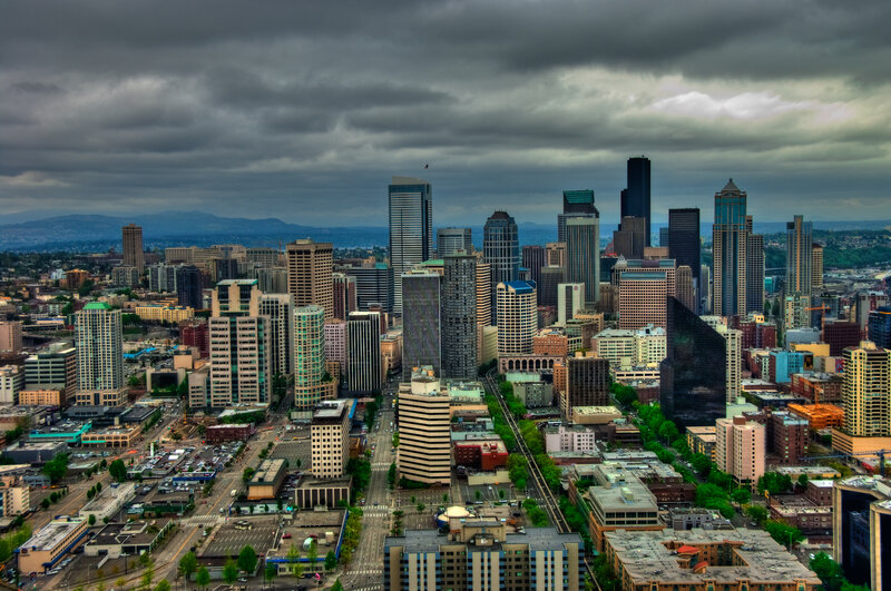 Seattle skyline under cloudy sky