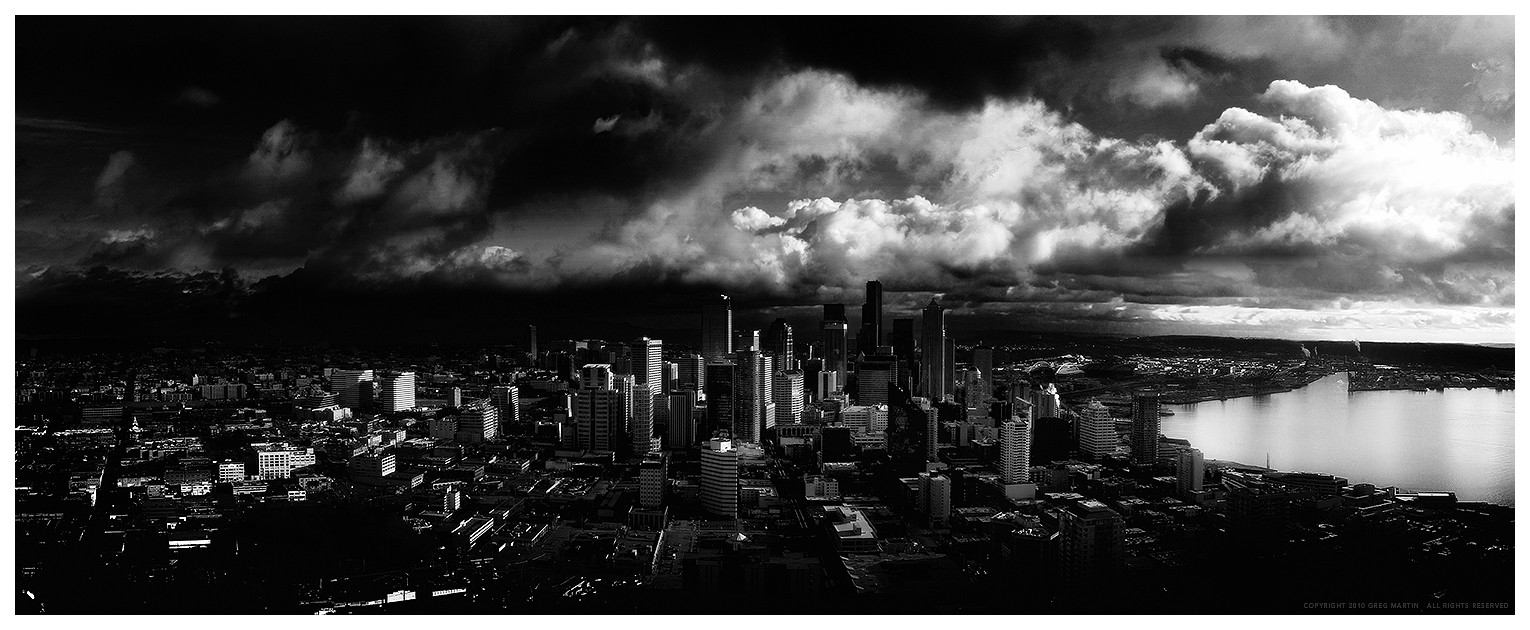 Seattle skyline under storm clouds