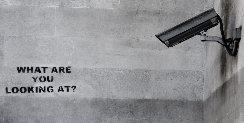 Security Camera on Wall — Gray, Dramatic, Photograph