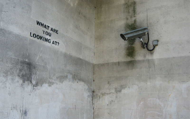 Security Camera on Wall — Gray, Dystopian, Photograph