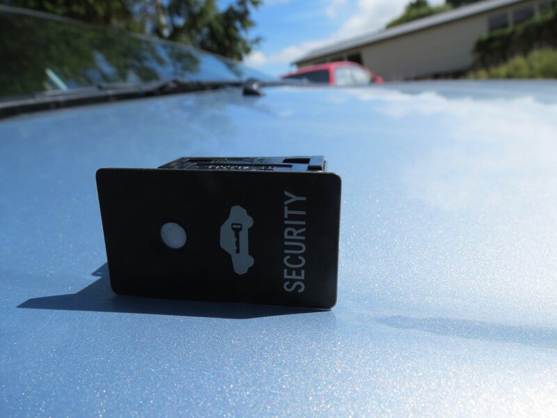 security device on car hood