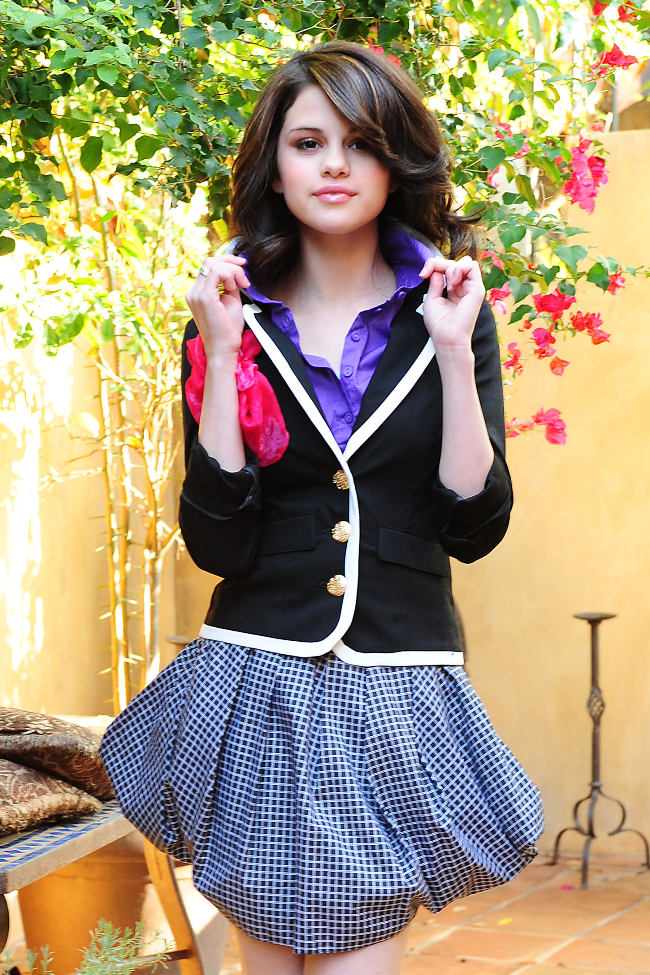 Selena Gomez in a school uniform