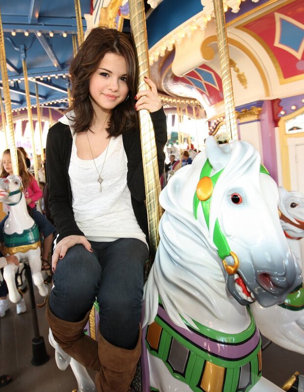 Selena Gomez on a carousel