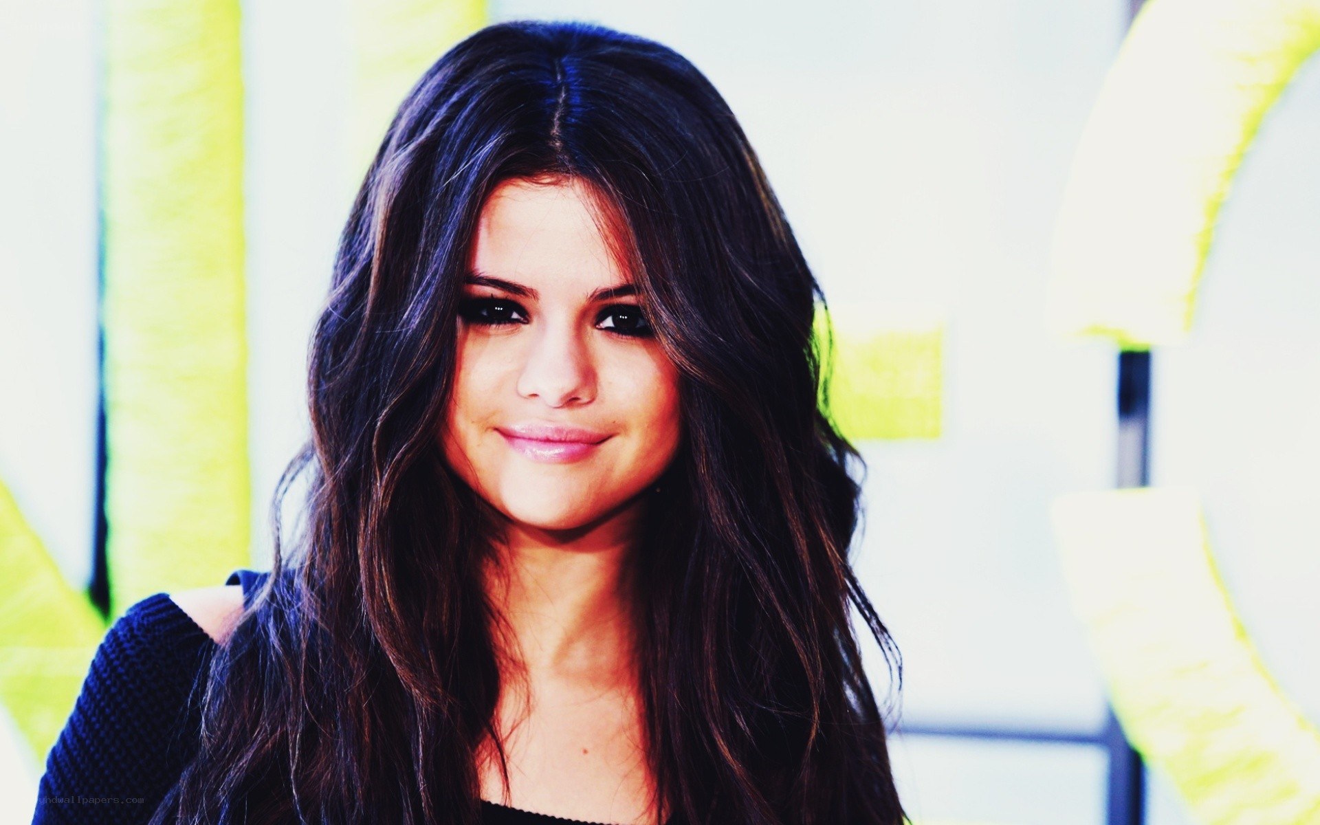 Selena Gomez smiling at event