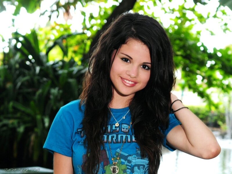Selena Gomez smiling outdoors