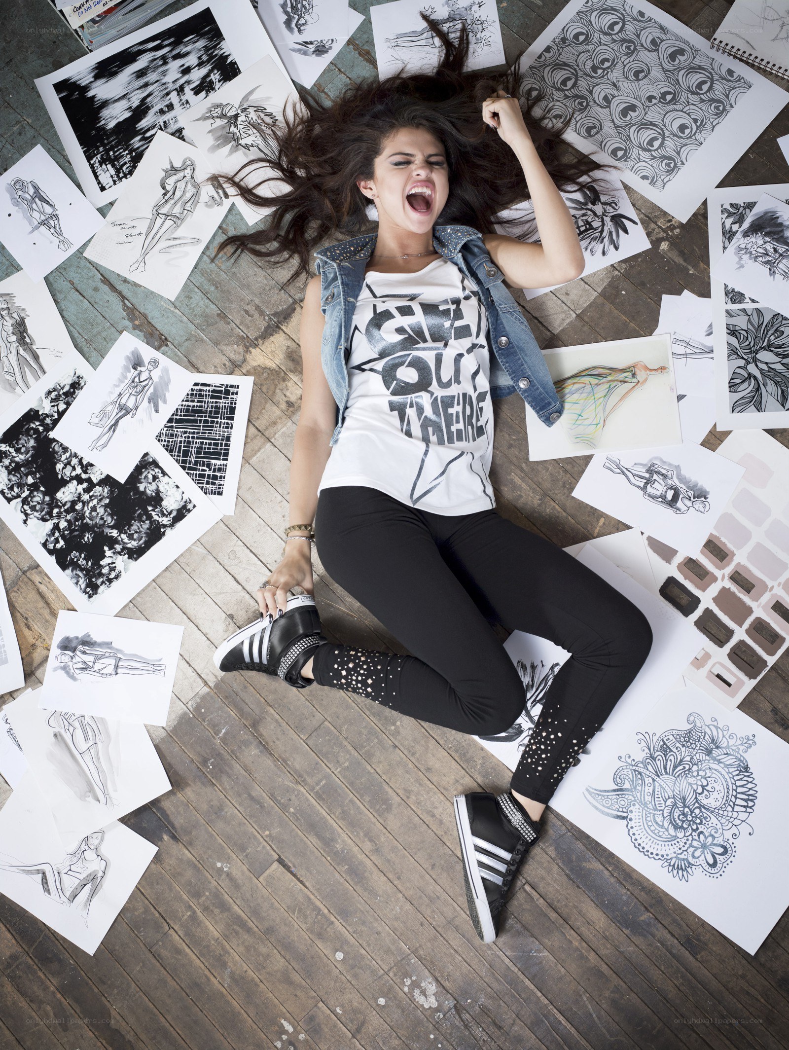 Selena Gomez surrounded by sketches