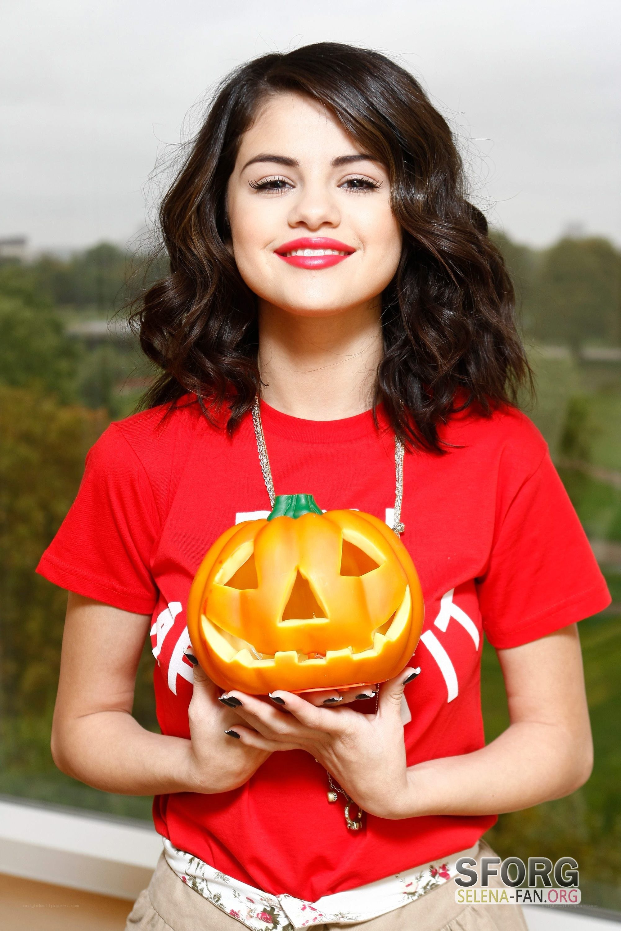 Selena Gomez with pumpkin